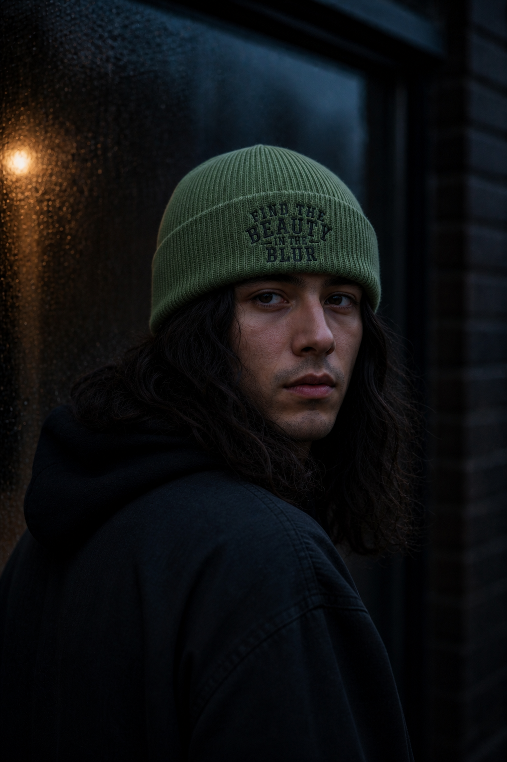 Portrait of a model wearing the Find the Beauty in the Blur embroidered beanie